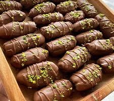 تصویر 4 از قیمت خرید شکلات خرمایی مغزدار + فروش ویژه