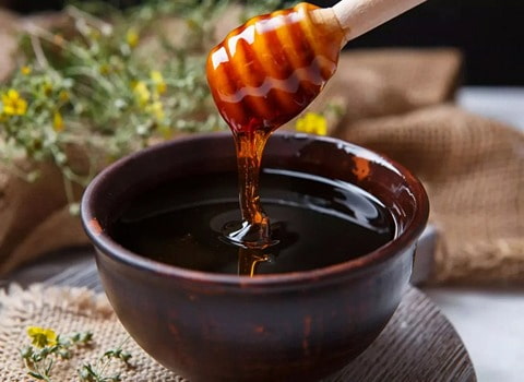 تصویر 1 از قیمت عسل سیاه خراسان با کیفیت ارزان + خرید عمده