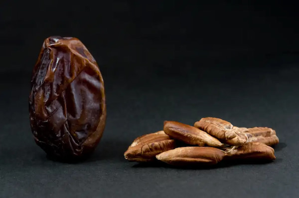 تصویر 1 از قیمت خرید روغن هسته خرما صادراتی عمده به صرفه و ارزان