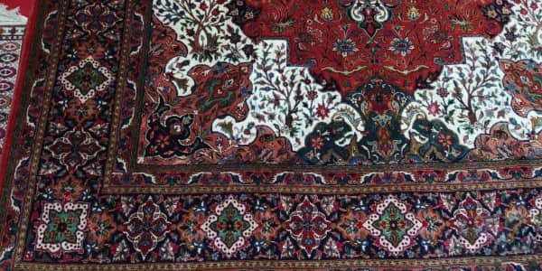 تصویر 1 از قیمت فرش دستباف قدیمی قرمز با کیفیت ارزان + خرید عمده