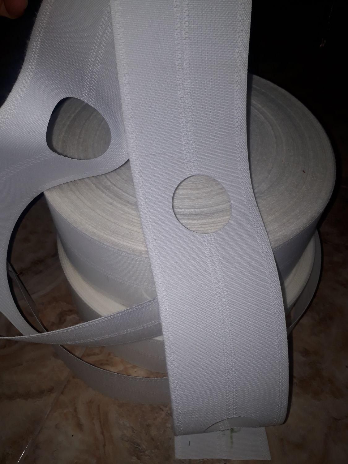 تصویر 1 از قیمت خرید نوار پرده پانچ بدون سوراخ + فروش ویژه