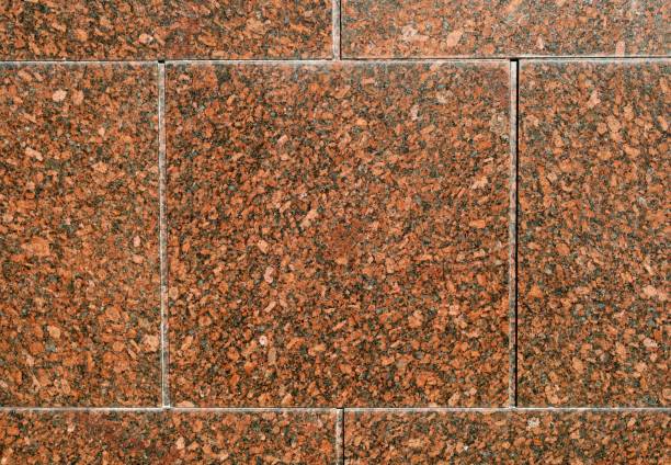 سنگ گرانیت لایبید با زمینه روشن و دانه بندی منظم