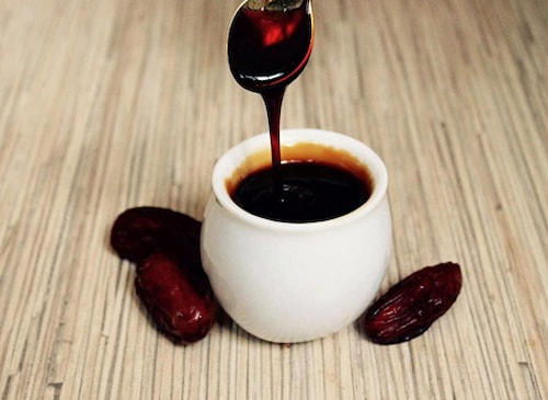 تصویر 1 از شیره خرما سنتی با عطر خوش و شیرینی ملایم
