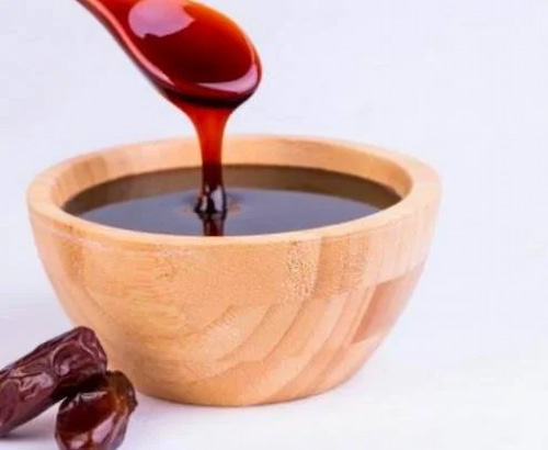 شیره خرما غلیظ و خوش‌ رنگ با کیفیت ممتاز