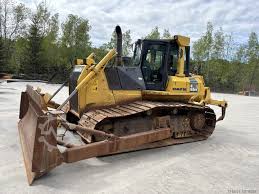 لودر چرخ زنجیری کوماتسو توان عملیاتی بالا در زمین های ناهموار