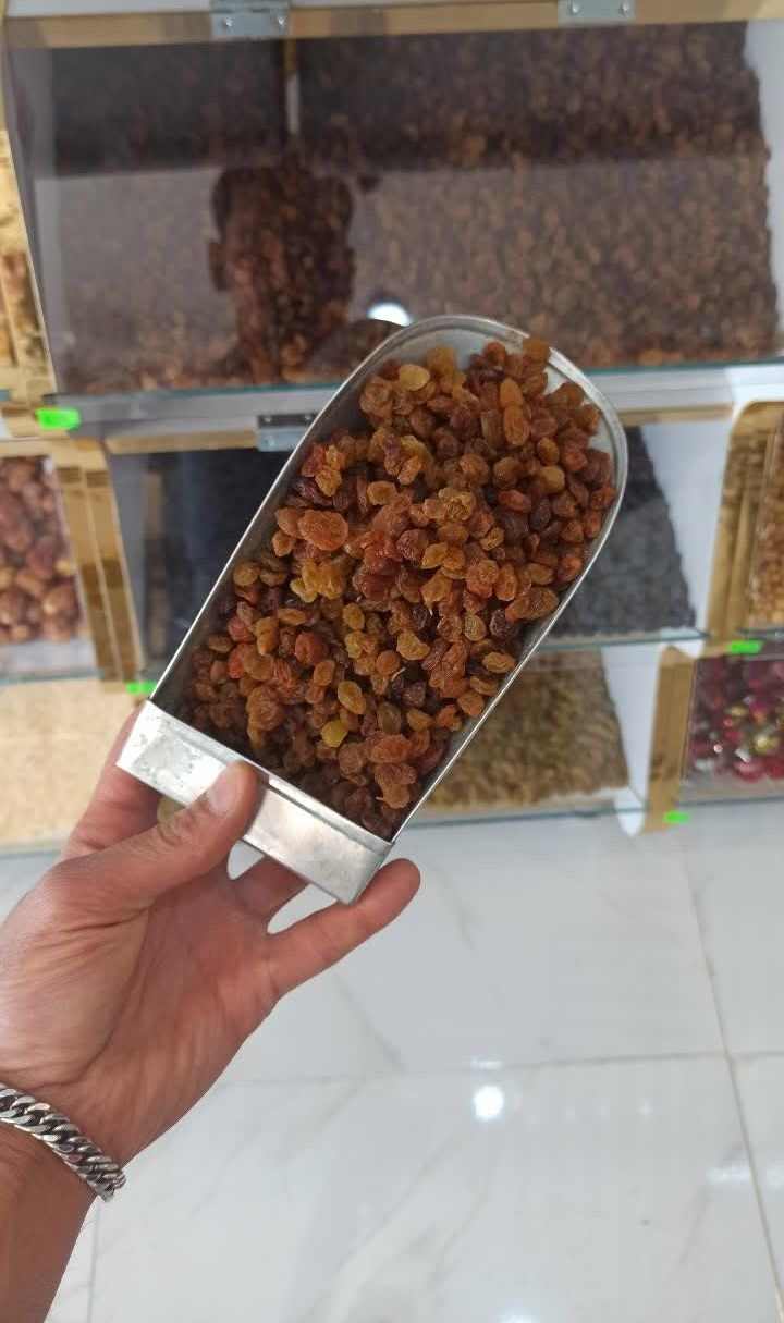 کشمش پلویی تیزابی بدون مواد شیمیایی مناسب مصرف غذایی