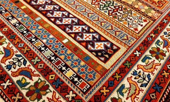 گلیم دستبافت پشمی با نقوش هندسی و جذاب